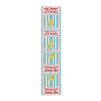 Limoncello Amore Mio table runner in polyester, 16 by 72 inches, blue and white stripes with retro Limoncello labels