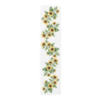 Sunflower table runner in cotton twill, 16 by 72 inches, laid flat with a repeating sunflower pattern