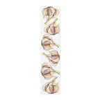 Garlic table runner in cotton twill, 16 by 72 inches, laid flat with a repeating watercolor garlic bulb pattern