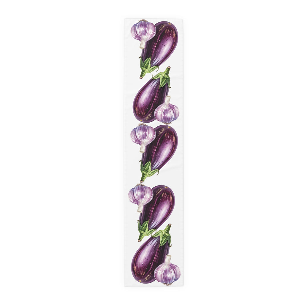 Eggplant and Garlic table runner in polyester, 16 by 72 inches, laid flat with a repeating eggplant and garlic pattern