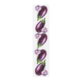 Eggplant and Garlic table runner in polyester, 16 by 72 inches, laid flat with a repeating eggplant and garlic pattern