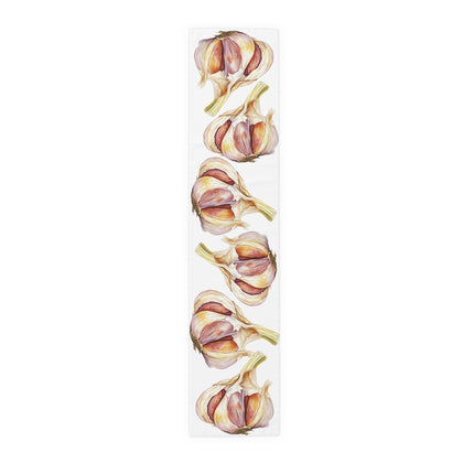 Garlic table runner in polyester, 16 by 72 inches, laid flat with a repeating watercolor garlic bulb pattern