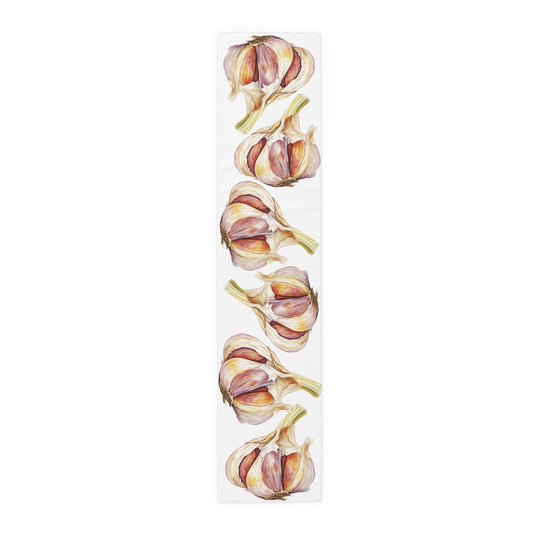 Garlic table runner in polyester, 16 by 72 inches, laid flat with a repeating watercolor garlic bulb pattern