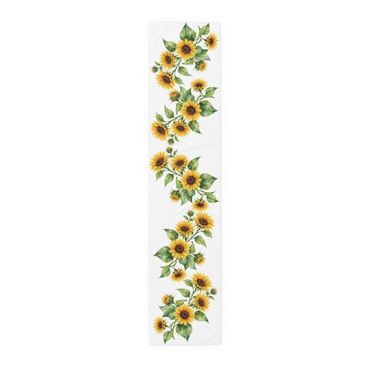 Sunflower table runner in polyester, 16 by 72 inches, laid flat with a repeating sunflower pattern