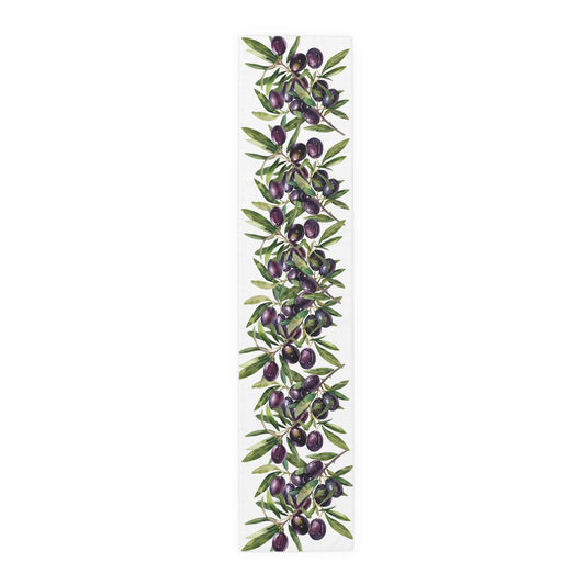 Olive Branch table runner in polyester, 16 by 72 inches, laid flat with repeating olive branches and dark olives