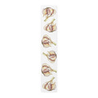 Garlic table runner in cotton twill, 16 by 90 inches, the longer size laid flat with the same repeating print