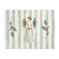 Angels and holly Christmas placemat laid flat, with the angel between two sprigs of red-berried holly on a soft green stripe