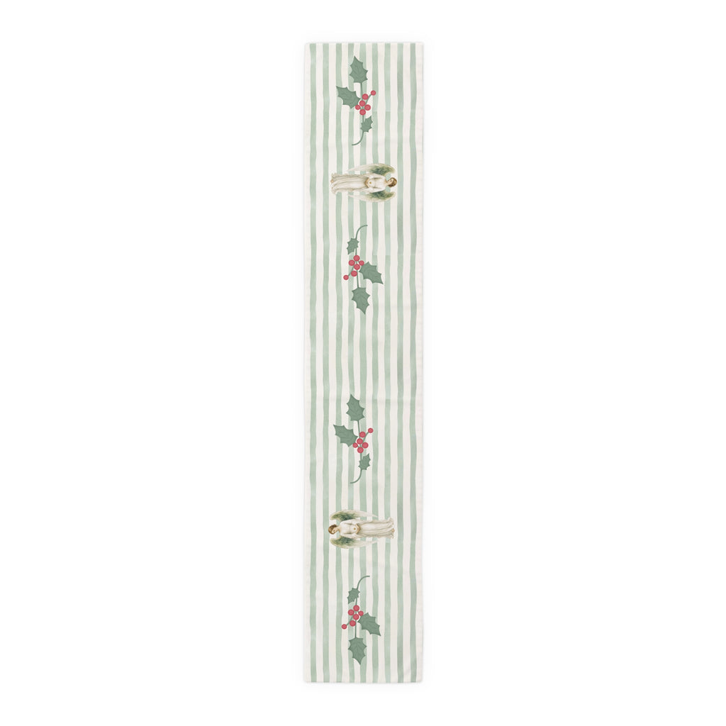 Angels and holly table runner, 90 inch in polyester, laid flat to show the angels and holly on a soft green stripe