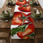 Tomato table runner on a rustic wooden table with green plates and water glasses